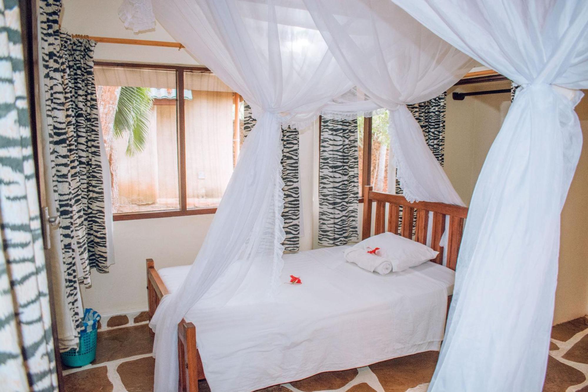 Kijani Cottages In Diani Diani Beach Extérieur photo