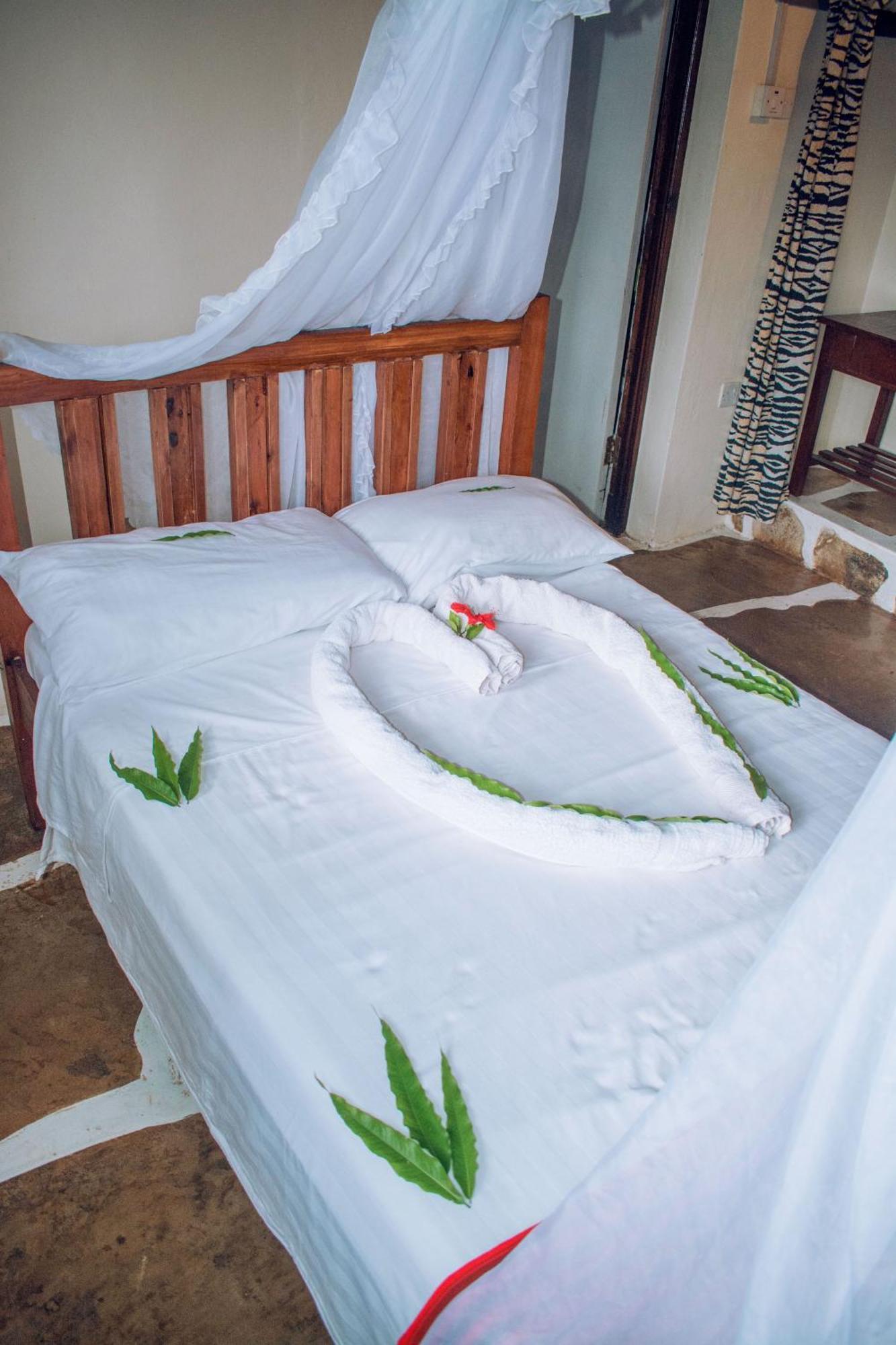 Kijani Cottages In Diani Diani Beach Extérieur photo
