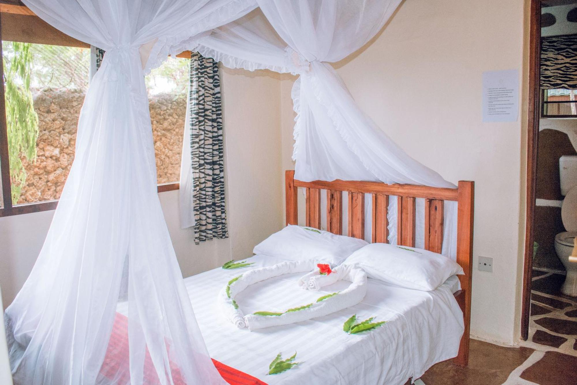 Kijani Cottages In Diani Diani Beach Extérieur photo