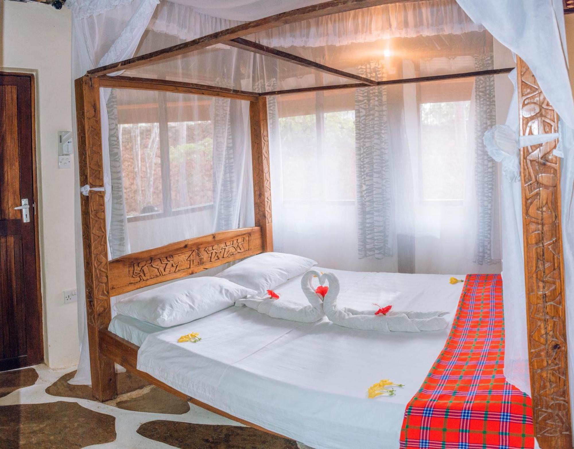 Kijani Cottages In Diani Diani Beach Extérieur photo